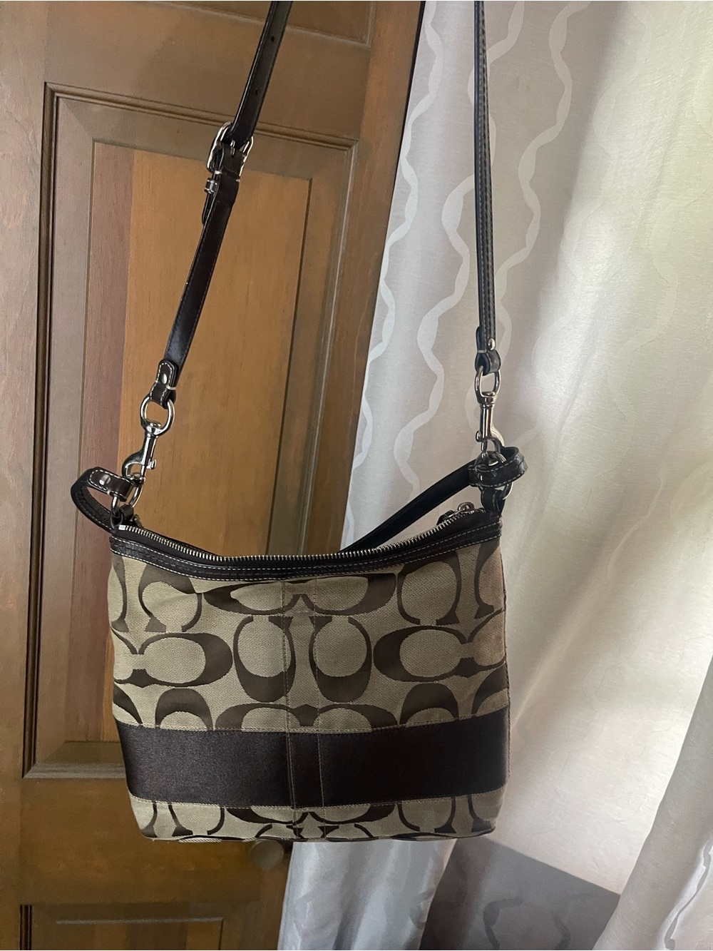 brown Coach Signature canvas and leather shoulder bag